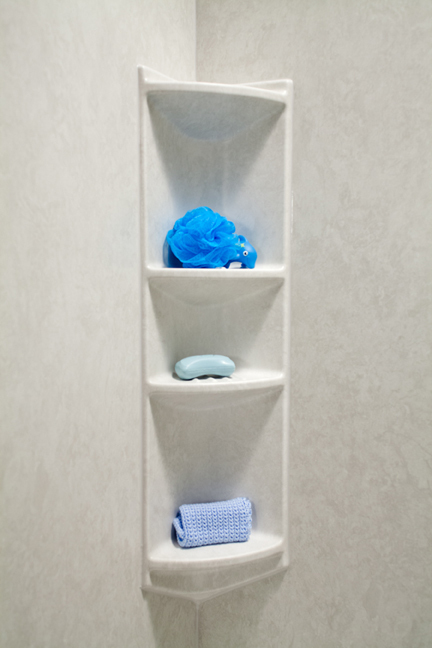 Four-shelf rectangular corner caddy in smooth white walls